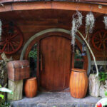 Hobbit House with round doors, barrels, treasure chest, nature plant and other decorations